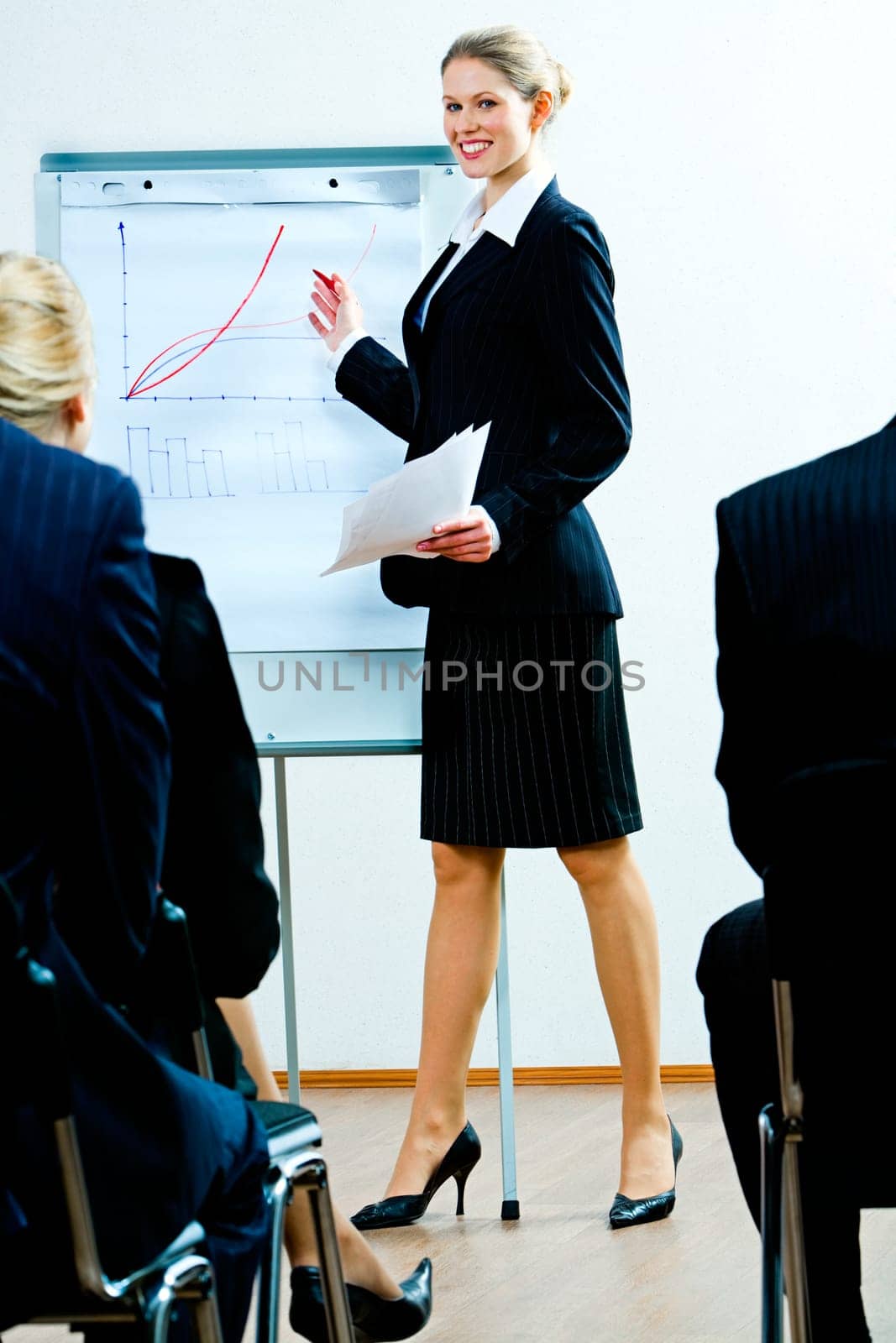 Image of successful woman teaching a business lecture