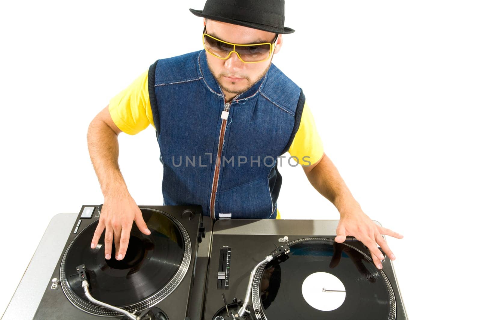 Portrait of smart deejay spinning turntables