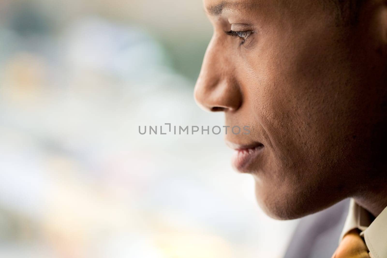 Image of attractive male with pensive expression on his face