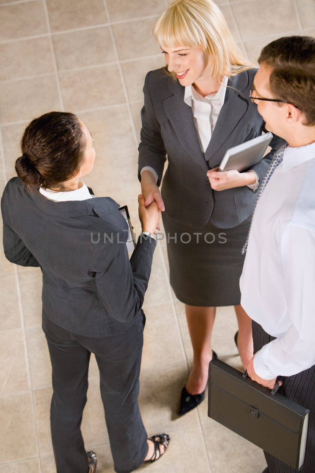 Business people shaking hands making an agreement