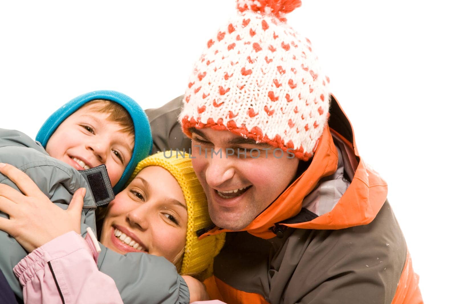 Image of cheerful family looking at camera over white background