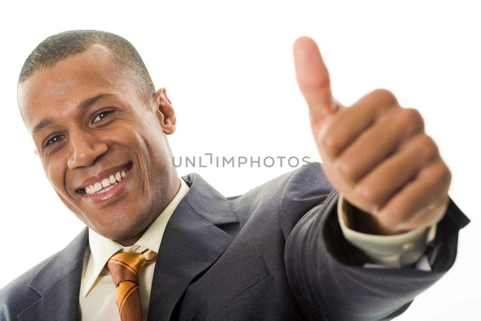 Happy businessman showing his thumb up with smile over white background