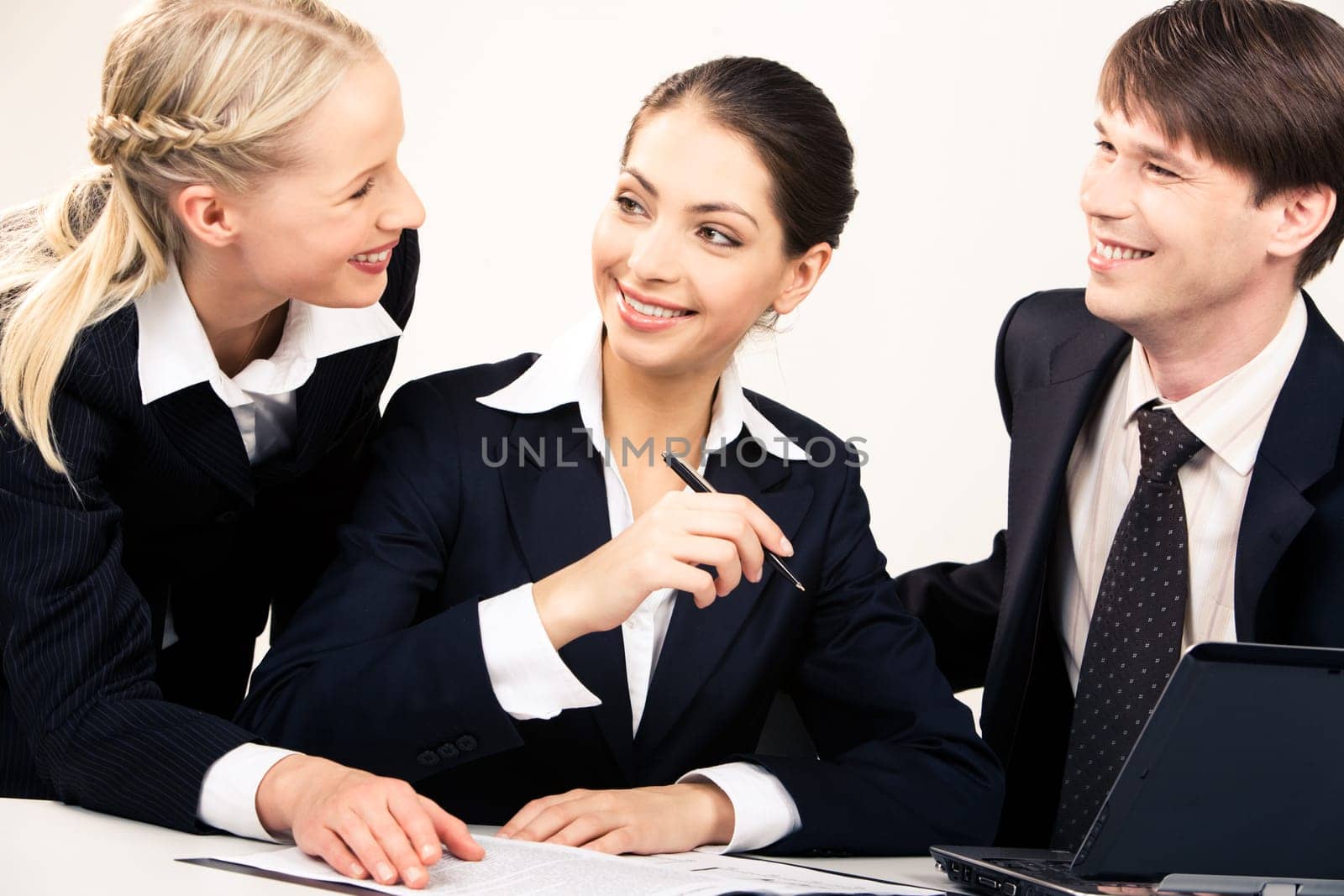 Portrait of working team discussing a new plan together