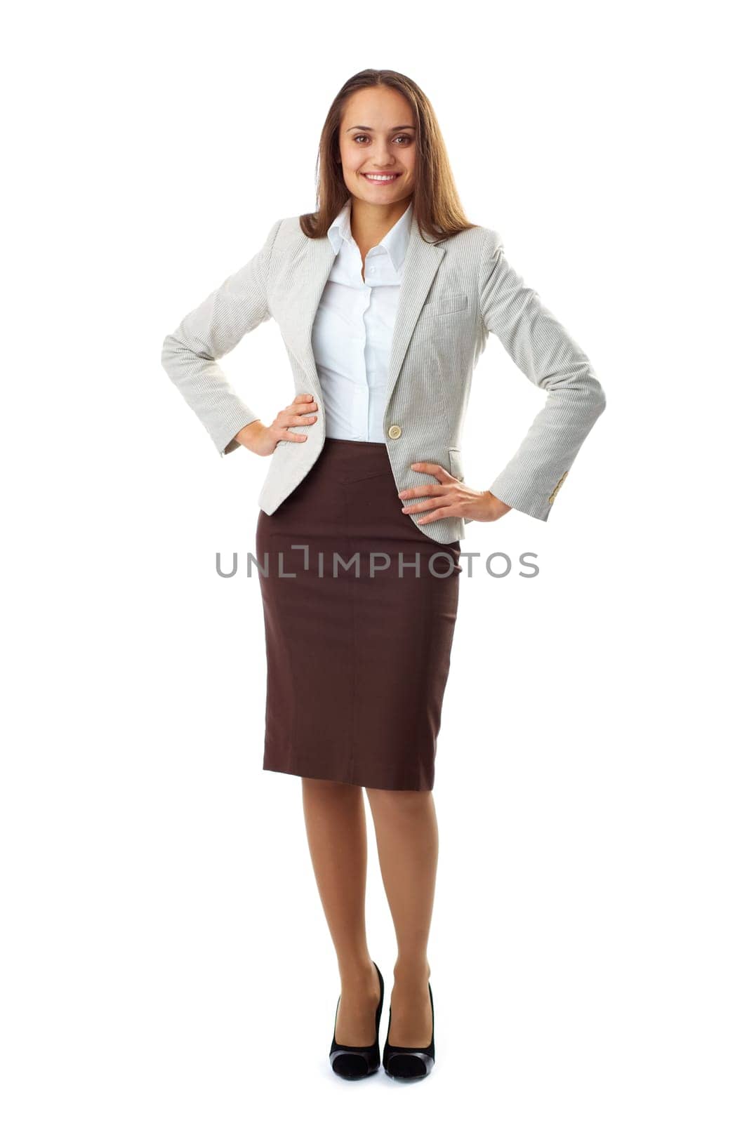 Portrait of elegant businesswoman looking at camera in isolation