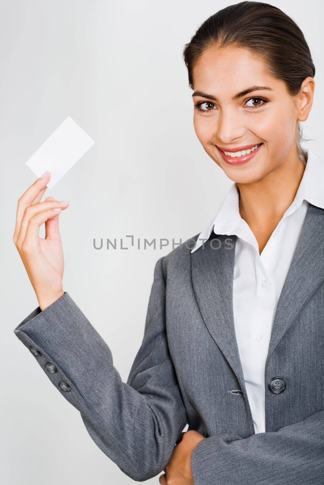 Young beautiful woman presenting her business card