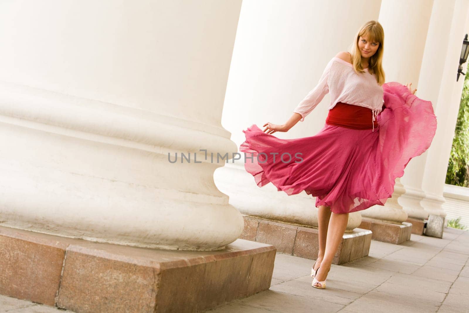 Portrait of smart woman in fashionable clothing looking at camera passionately