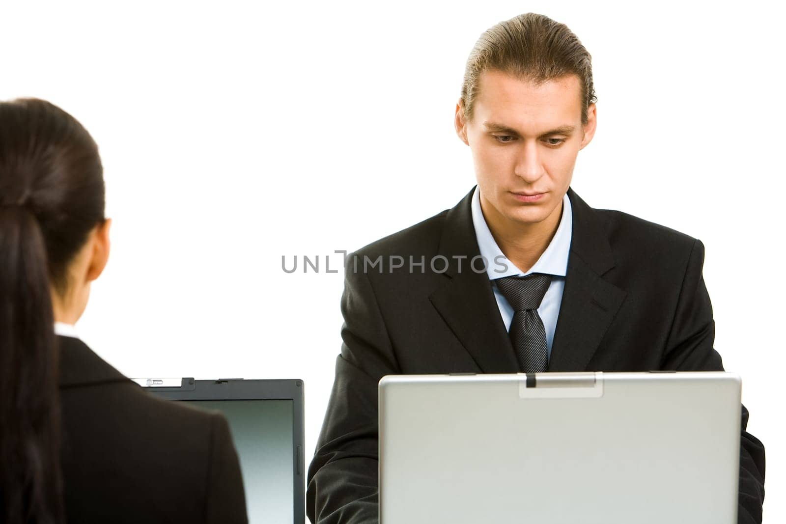 Portrait of executive employees working with laptop