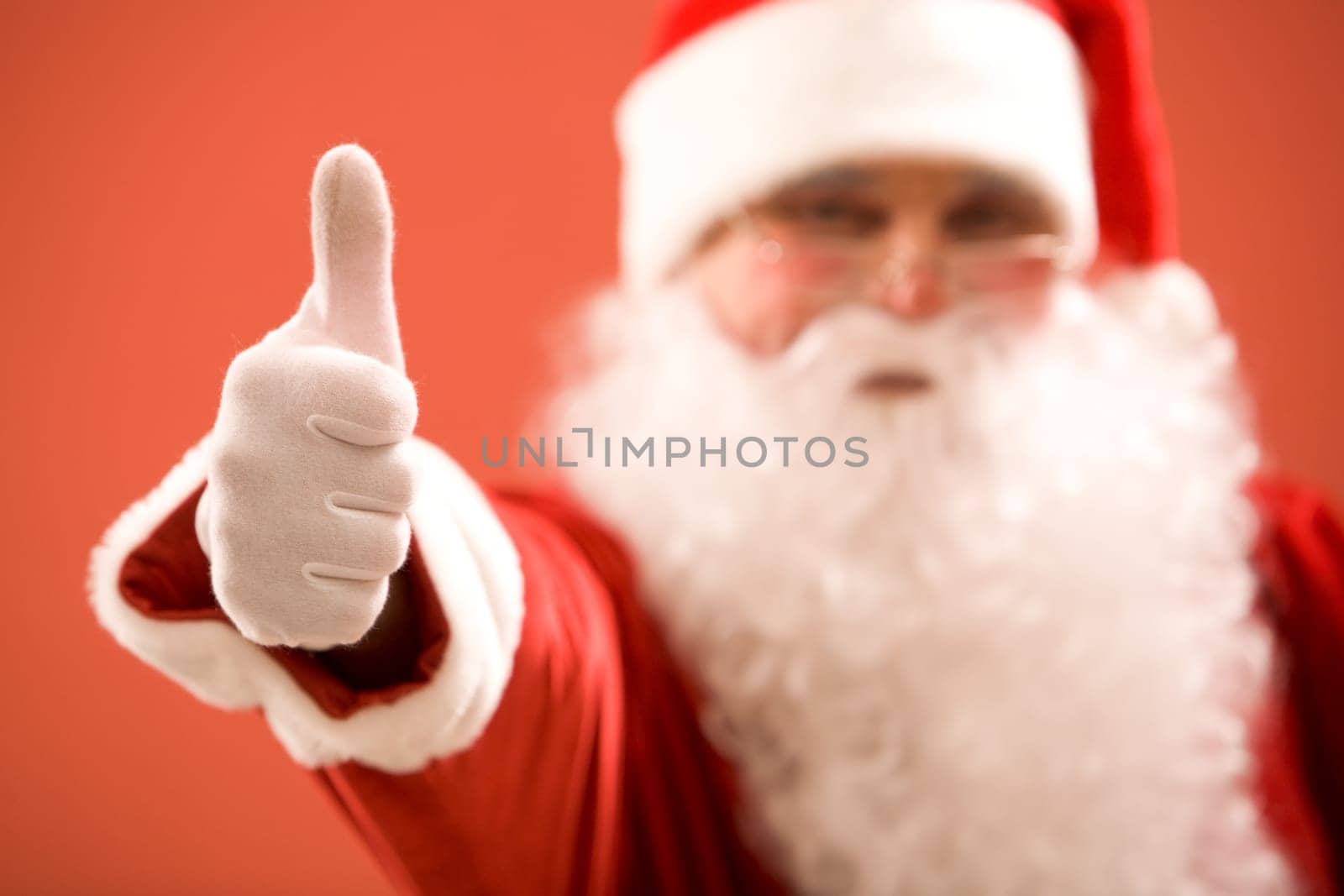 Photo of thumb up shown by Santa Claus