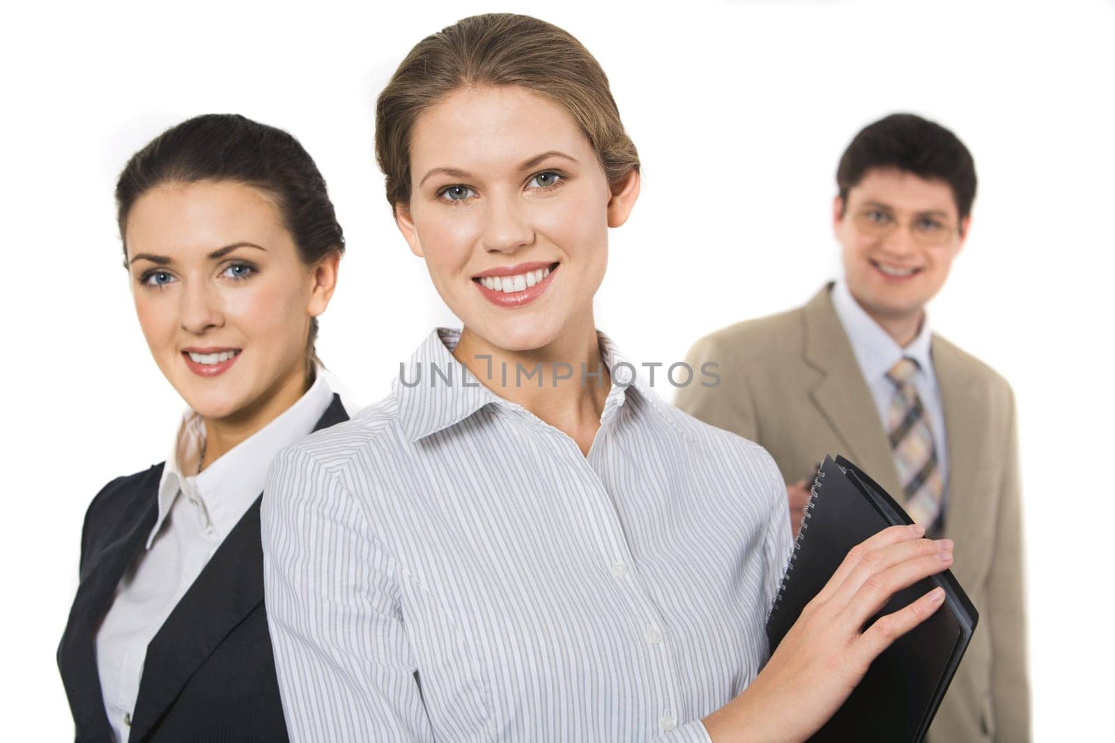 Portrait of two smiling women on the  background of man