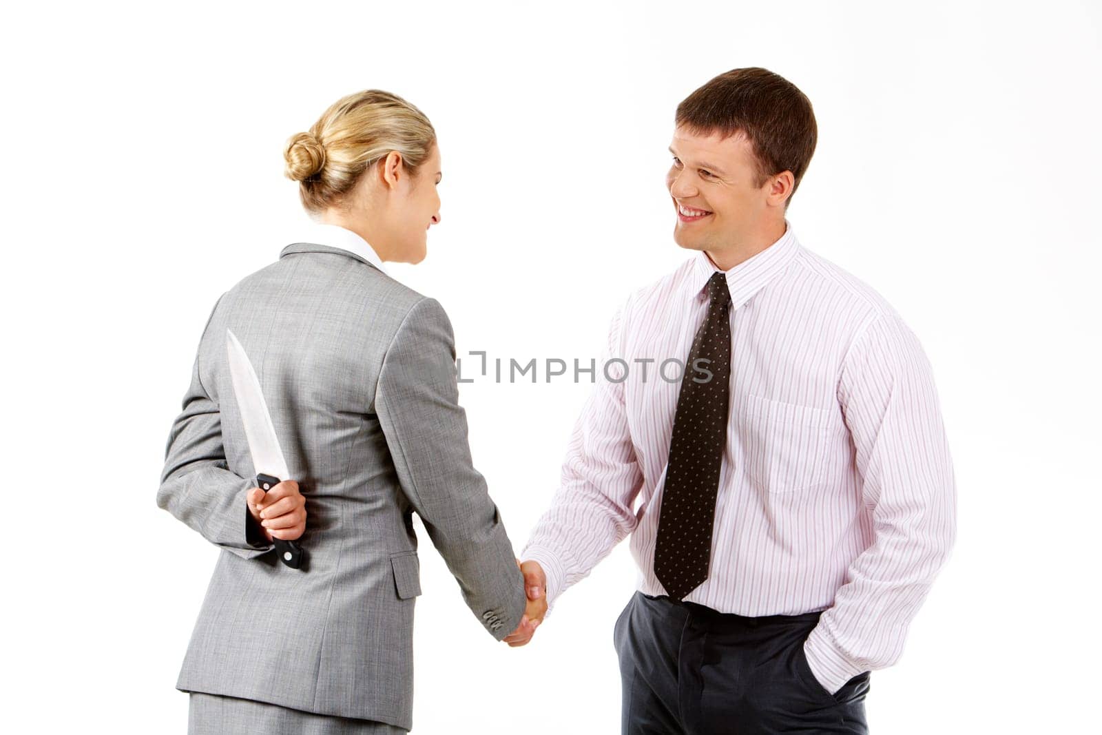 Conceptual image of business woman with knife doing agreement with businessman