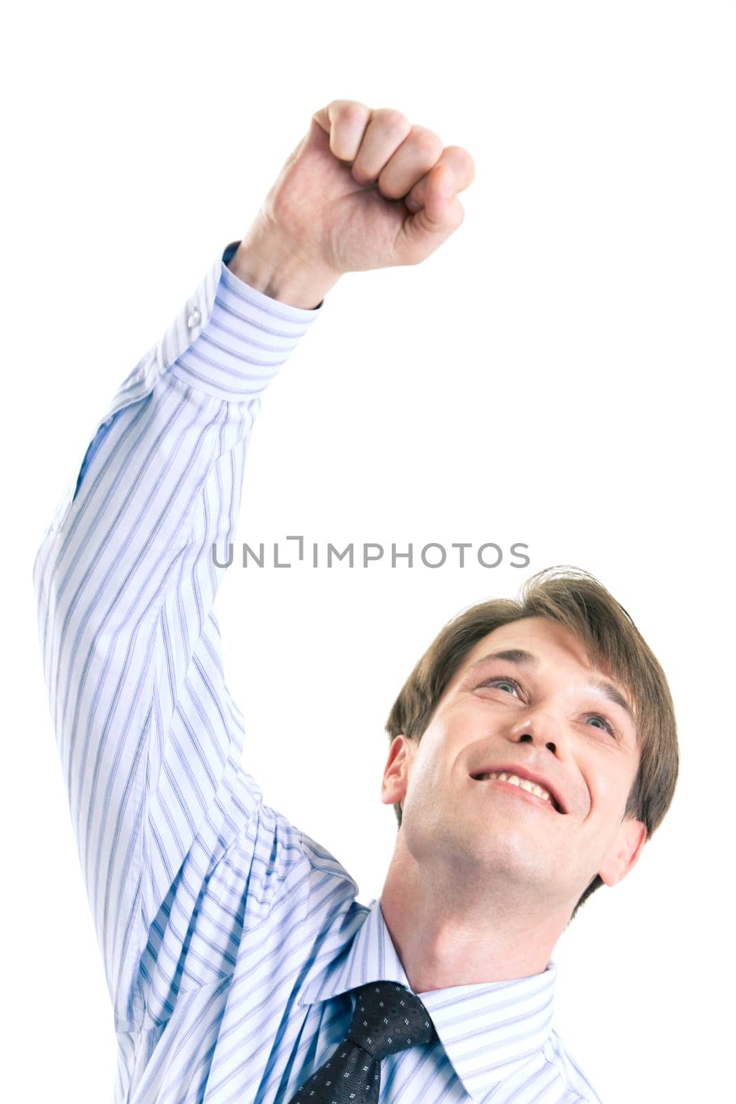 Joyful businessman in shirt raising his hand