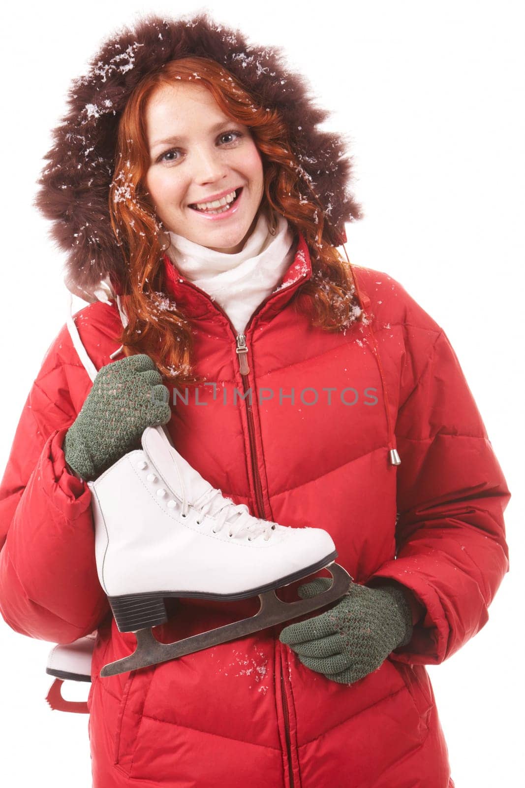 Portrait of smiling girl with skates looking at camera