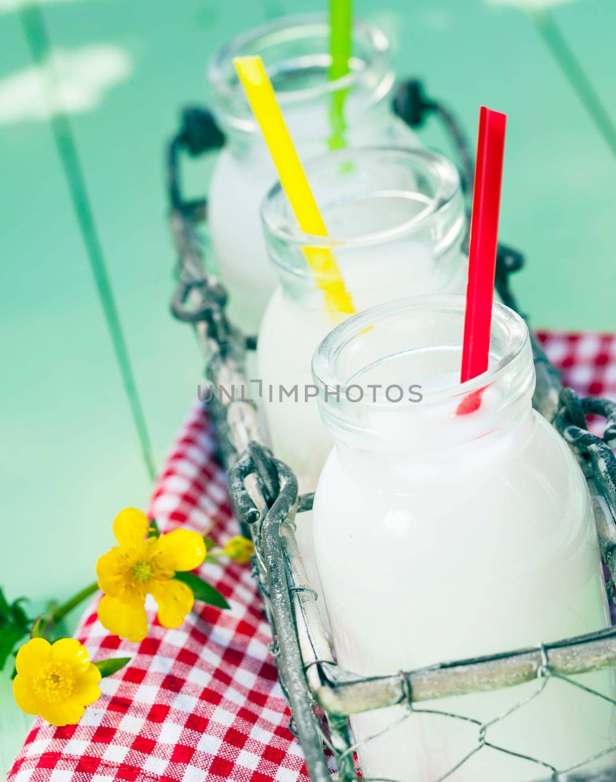 Assorted Milk Beverages on a green background.