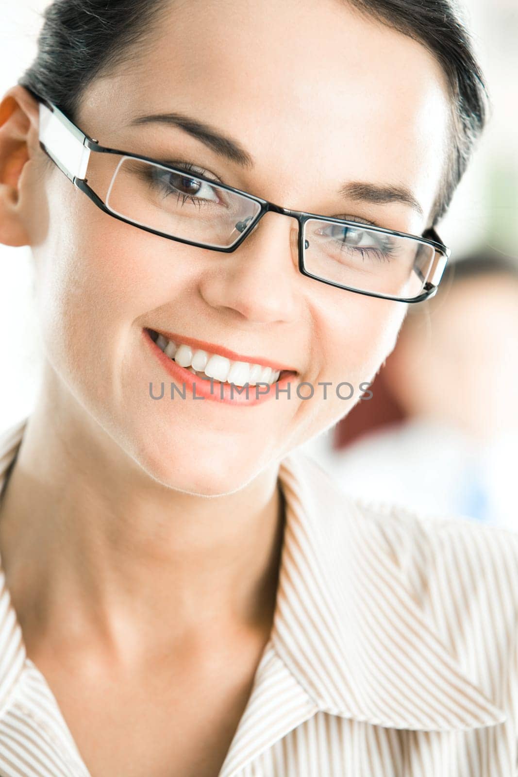 Face of happy business lady looking at camera with smile