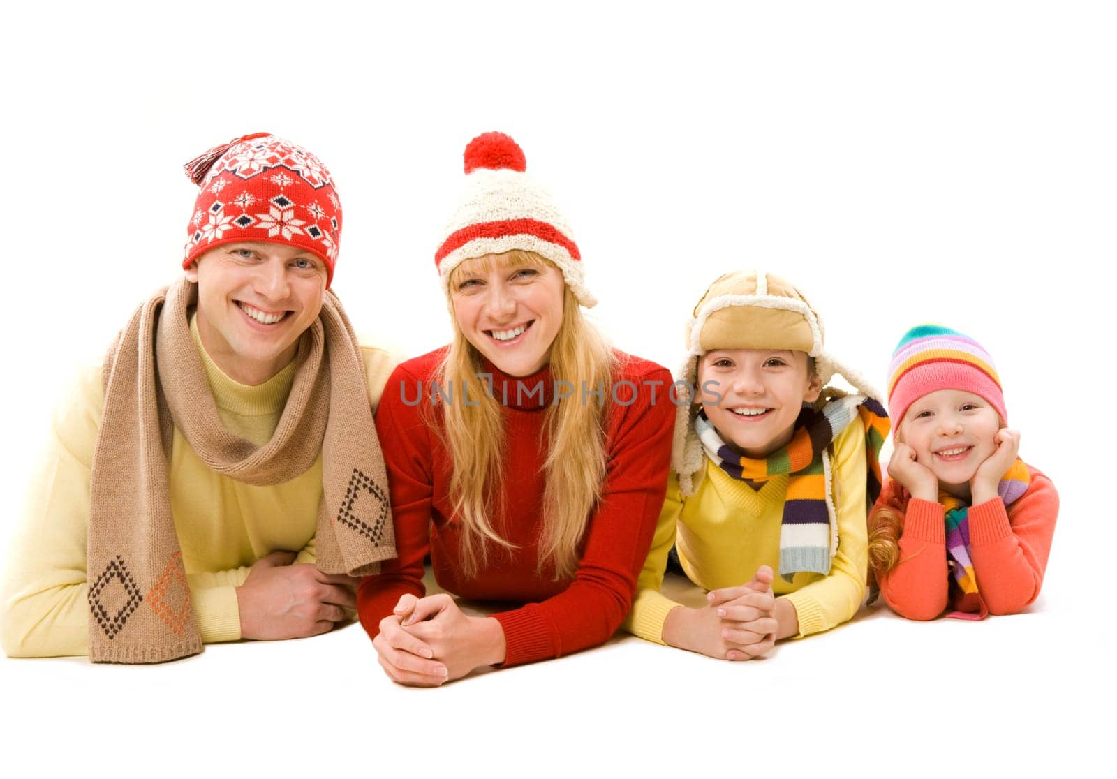 Happy family members looking at camera with smiles over white background