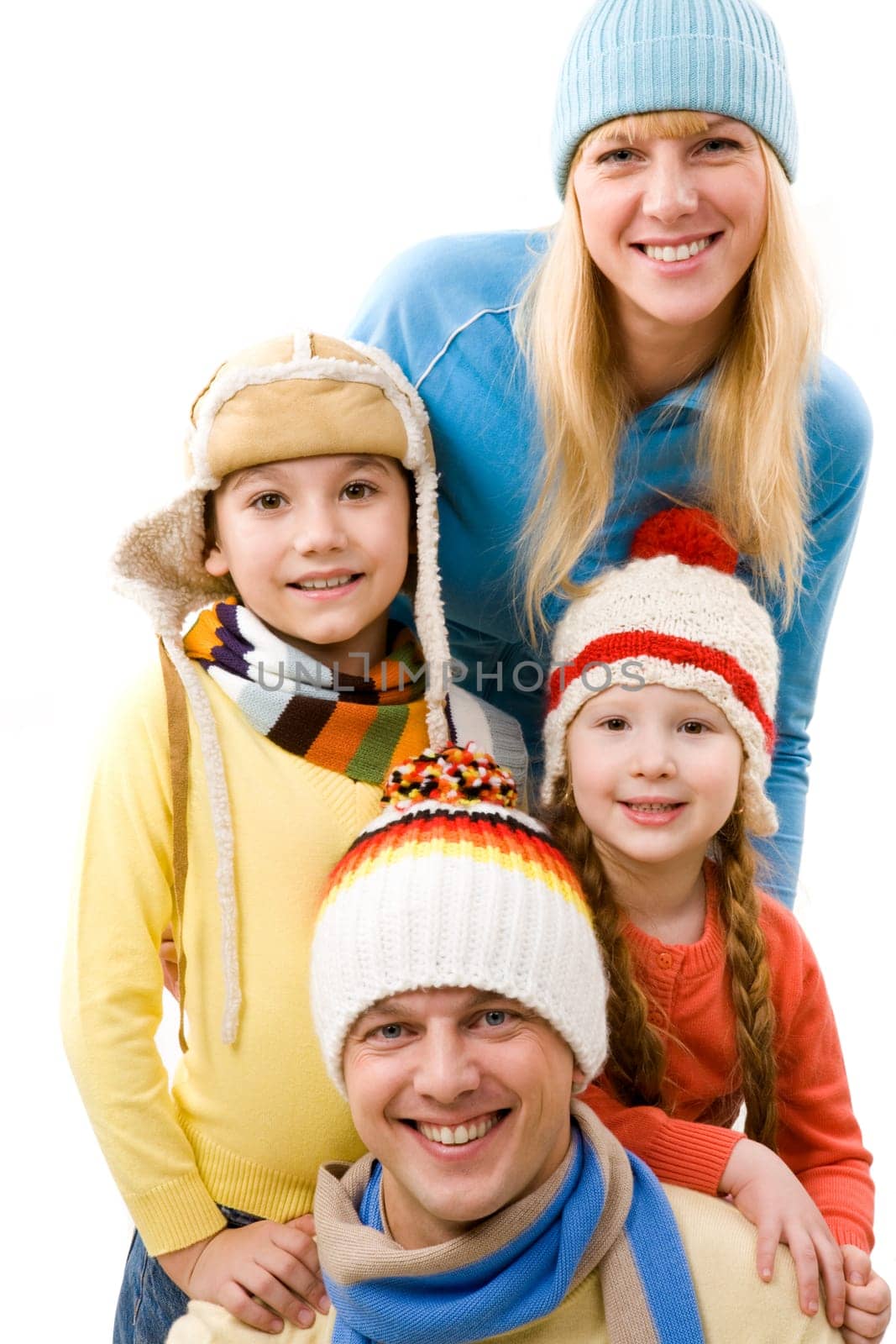 Happy family looking at camera and smiling