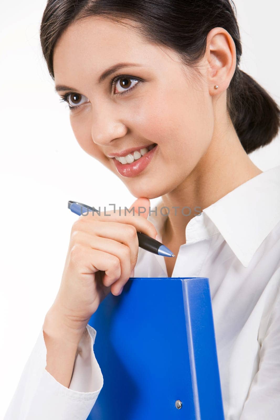Close-up of pretty employee with folder in hand smiling over white background