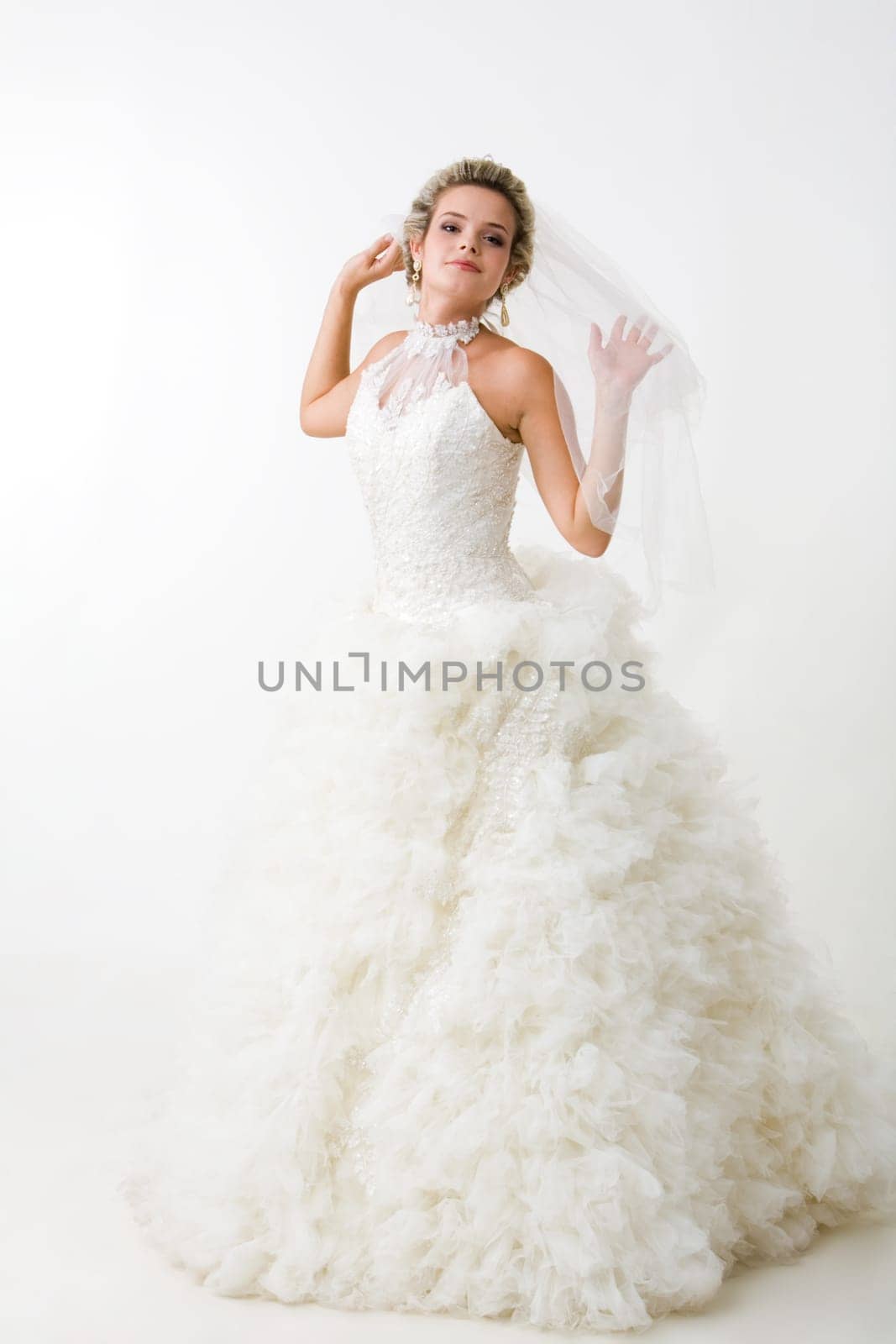 Portray of happy beautiful fiancee in white fashion dress