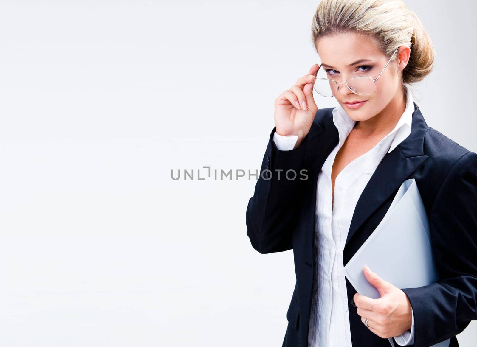 Portrait of clever business lady with glasses isolated on a white background