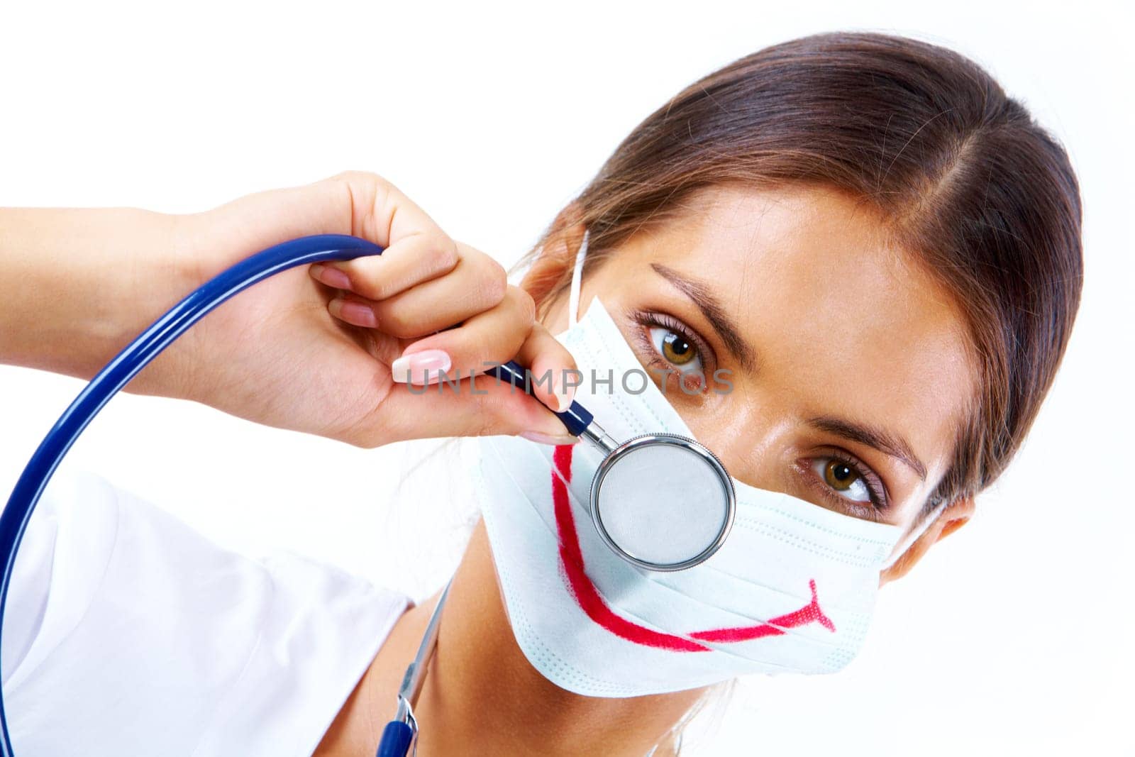 Portrait of assistant in mask with big smile on it looking at camera