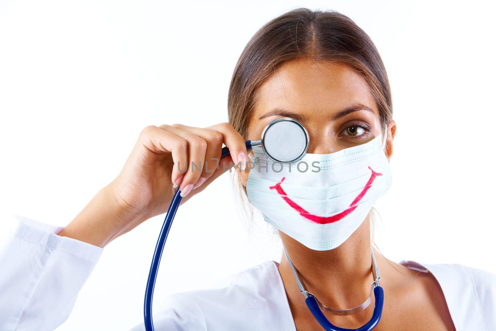 Portrait of assistant in mask with big smile on it looking at camera