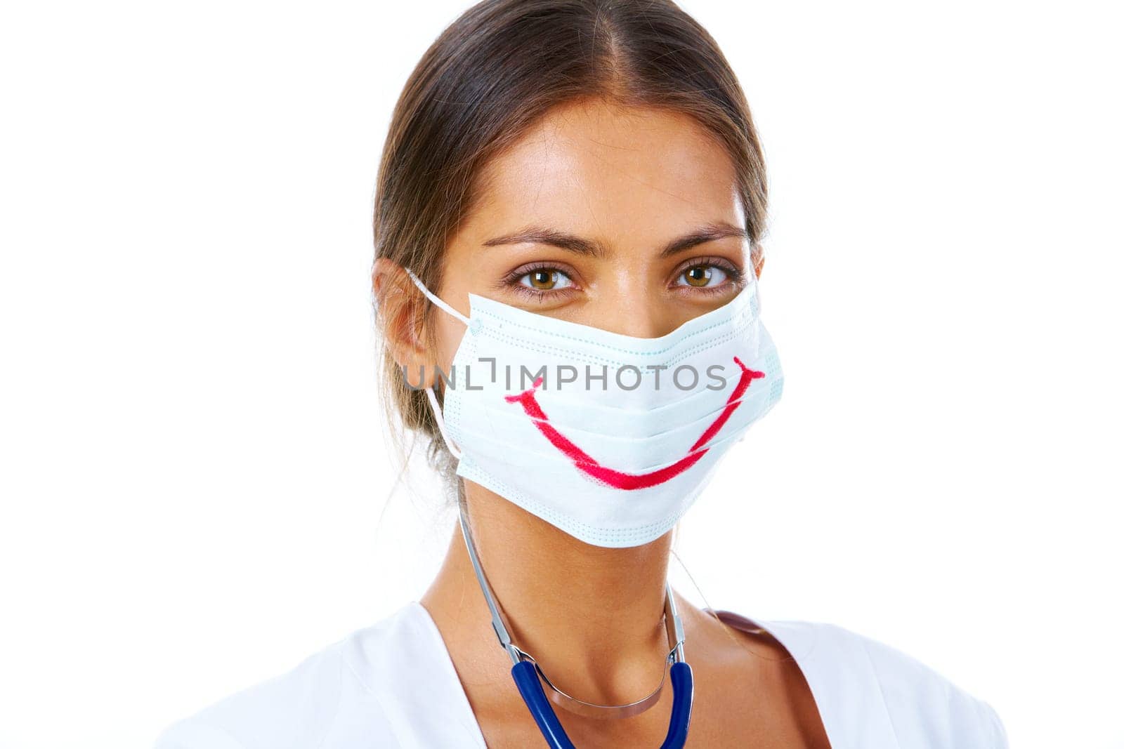 Portrait of assistant in mask with big smile on it looking at camera