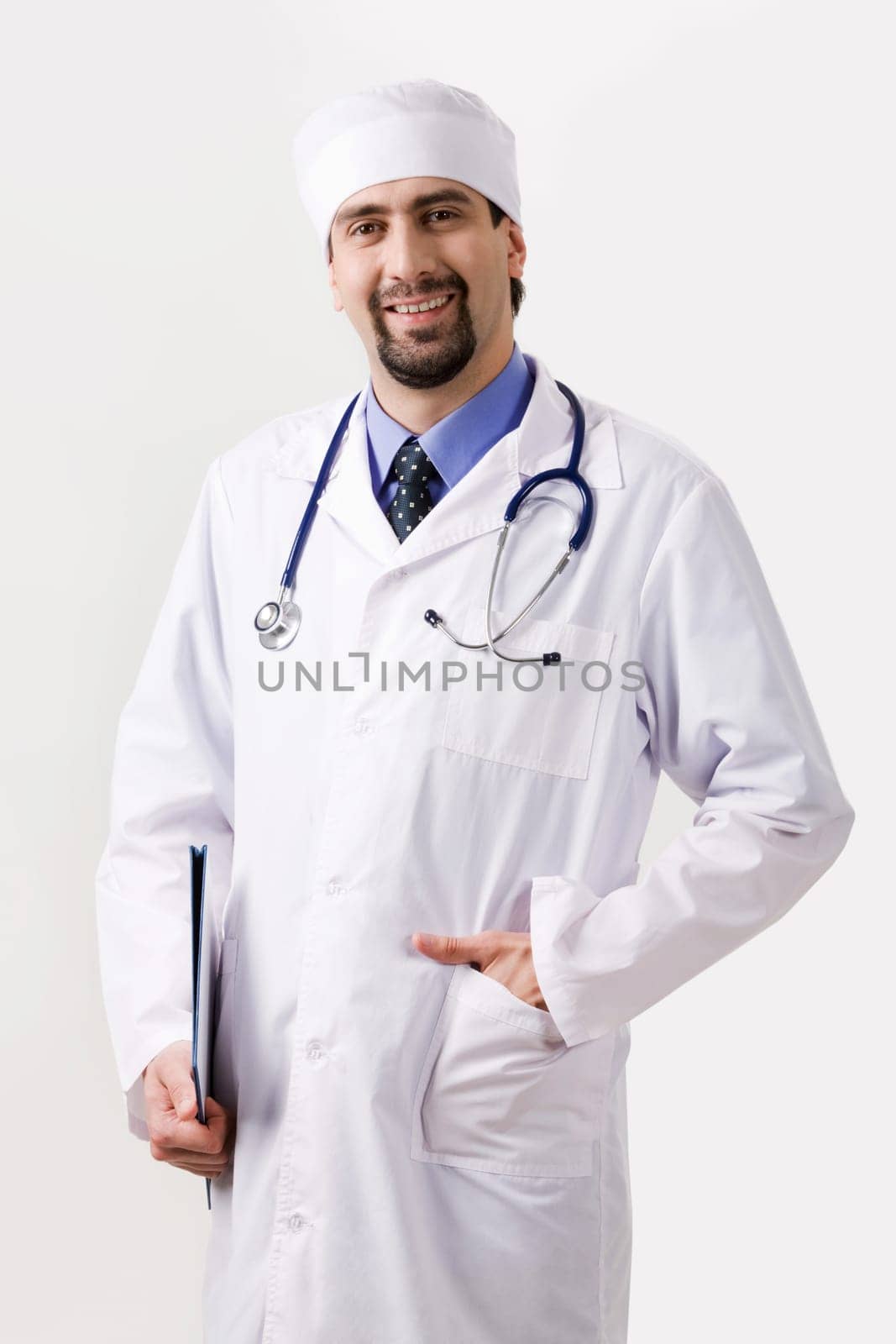 Portrait of confident doctor with stethoscope on his neck looking at camera