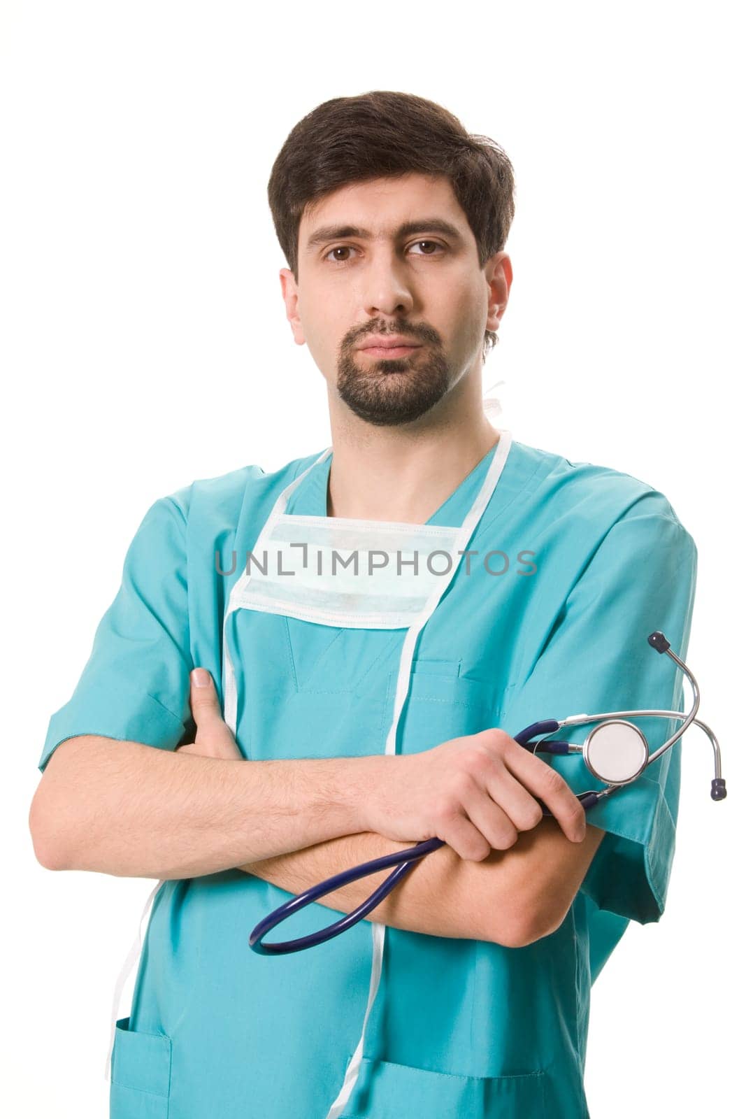 Portrait of confident doctor with stethoscope in hand looking at camera