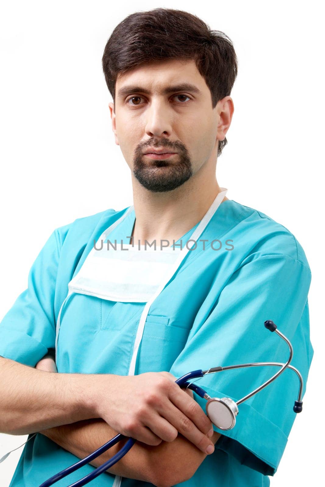 Portrait of confident doctor with stethoscope in hand looking at camera