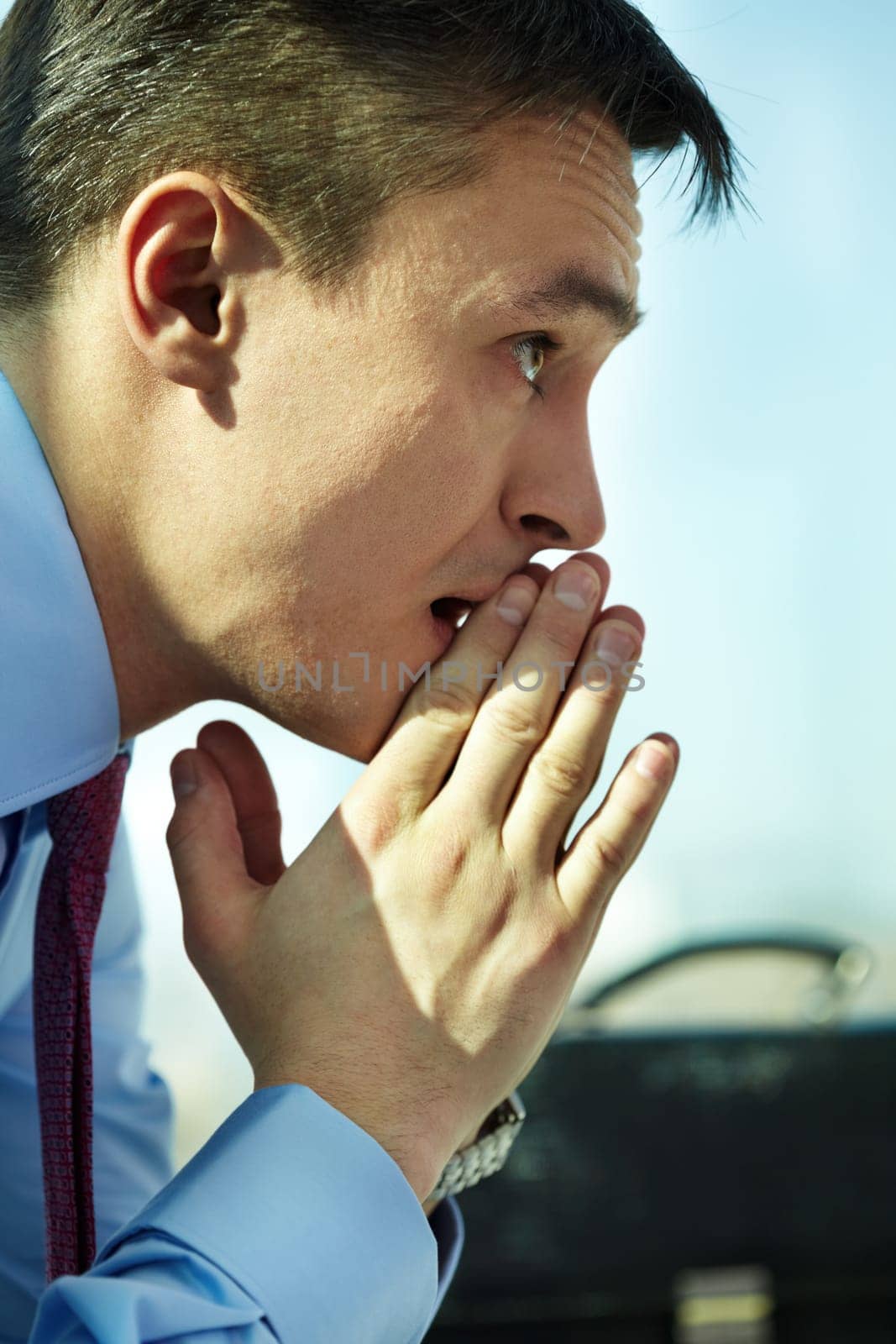 Profile of serious man concentrating on thoughts