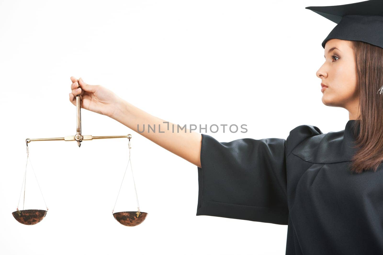 Young judge holding scales in isolation
