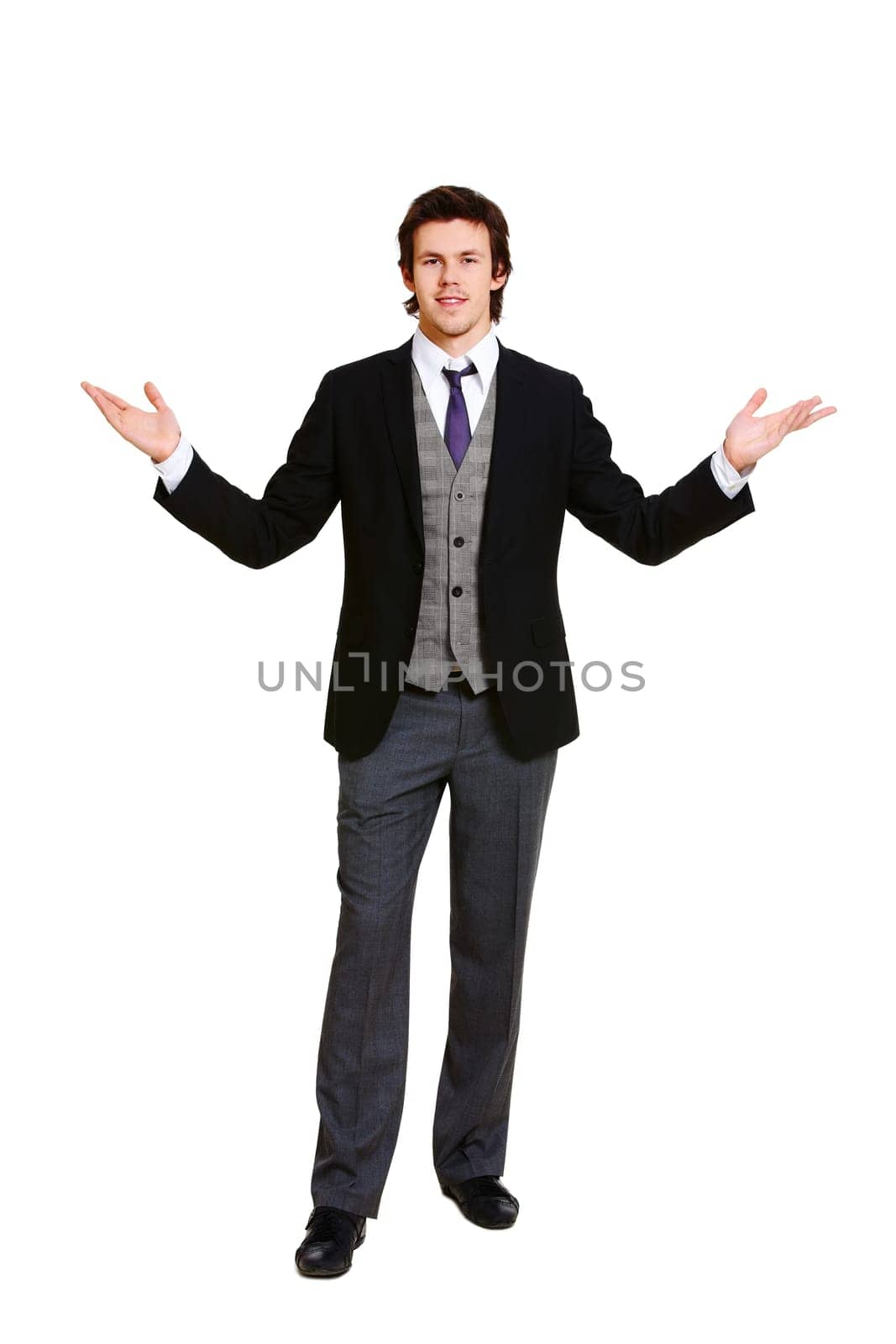 Stylish male in elegant suit looking at camera on white background