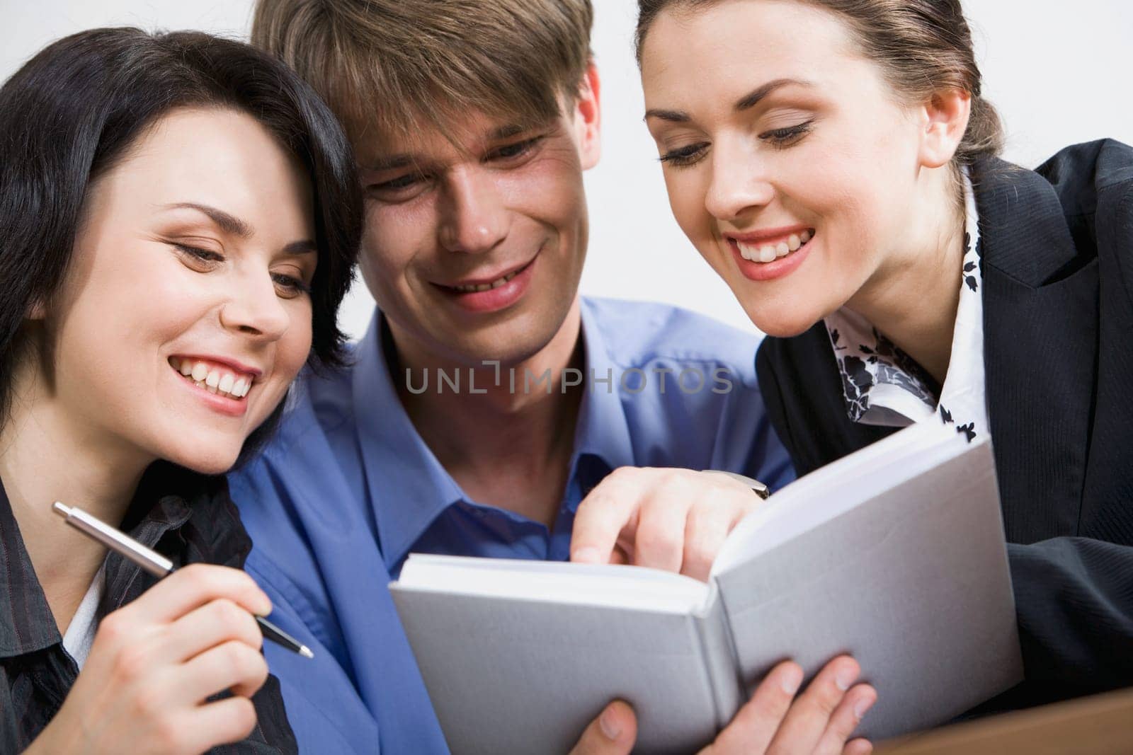 Manager is showing a right text to his colleagues