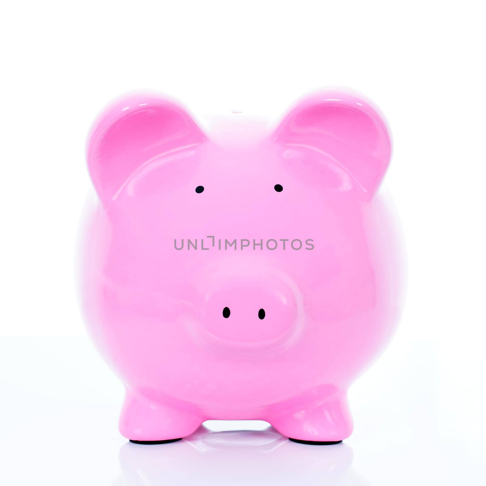 Pink piggy bank, isolated on white