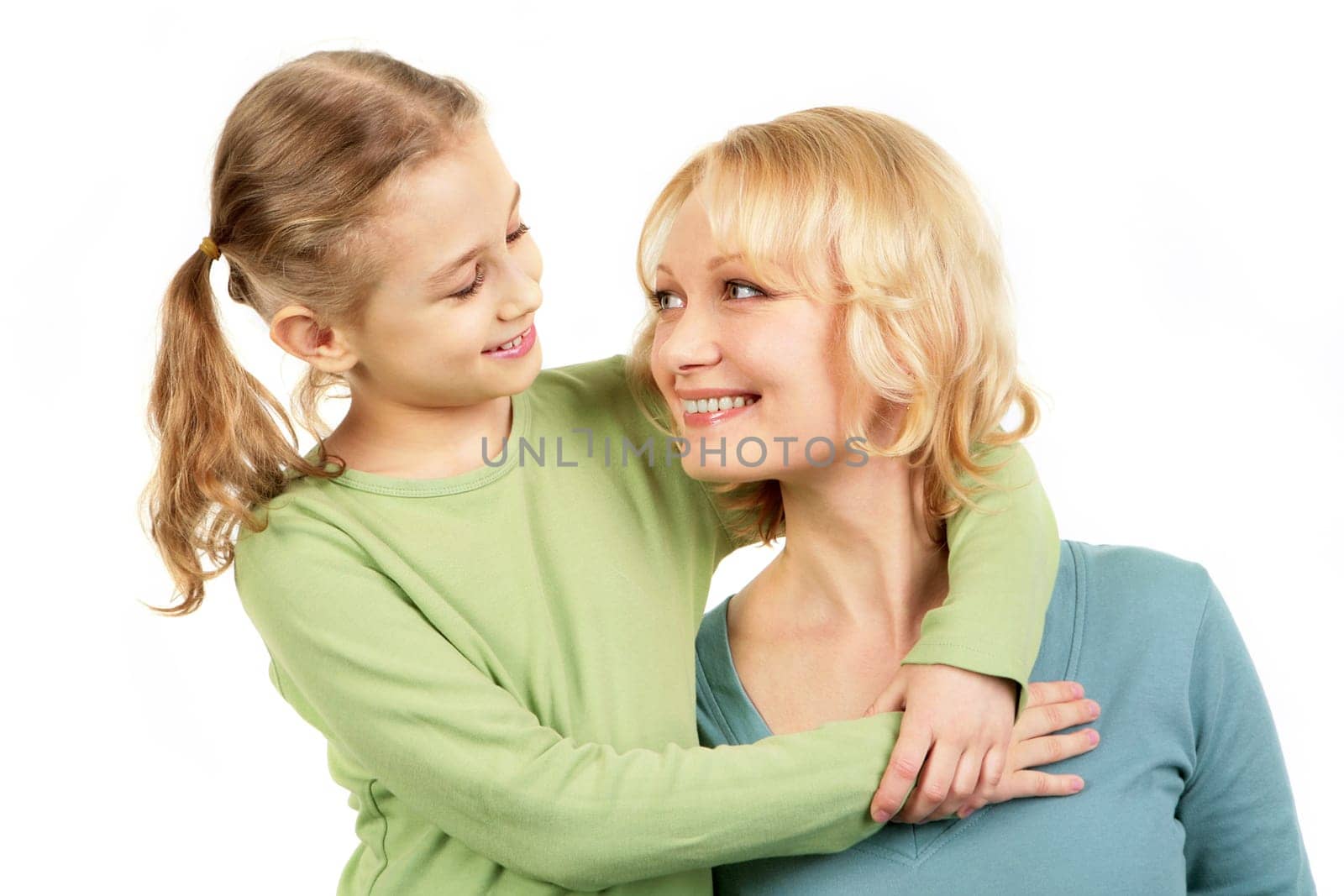 Portrait of little girl and mother face to face