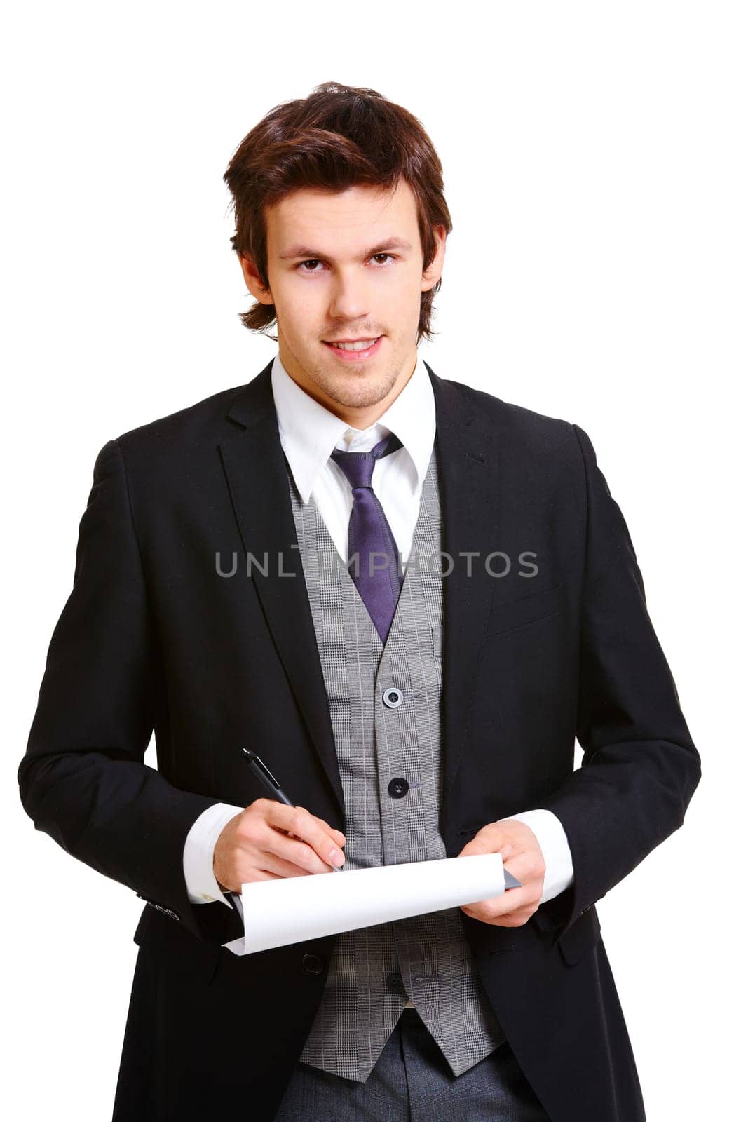 Confident businessman making notes and looking at camera on white background