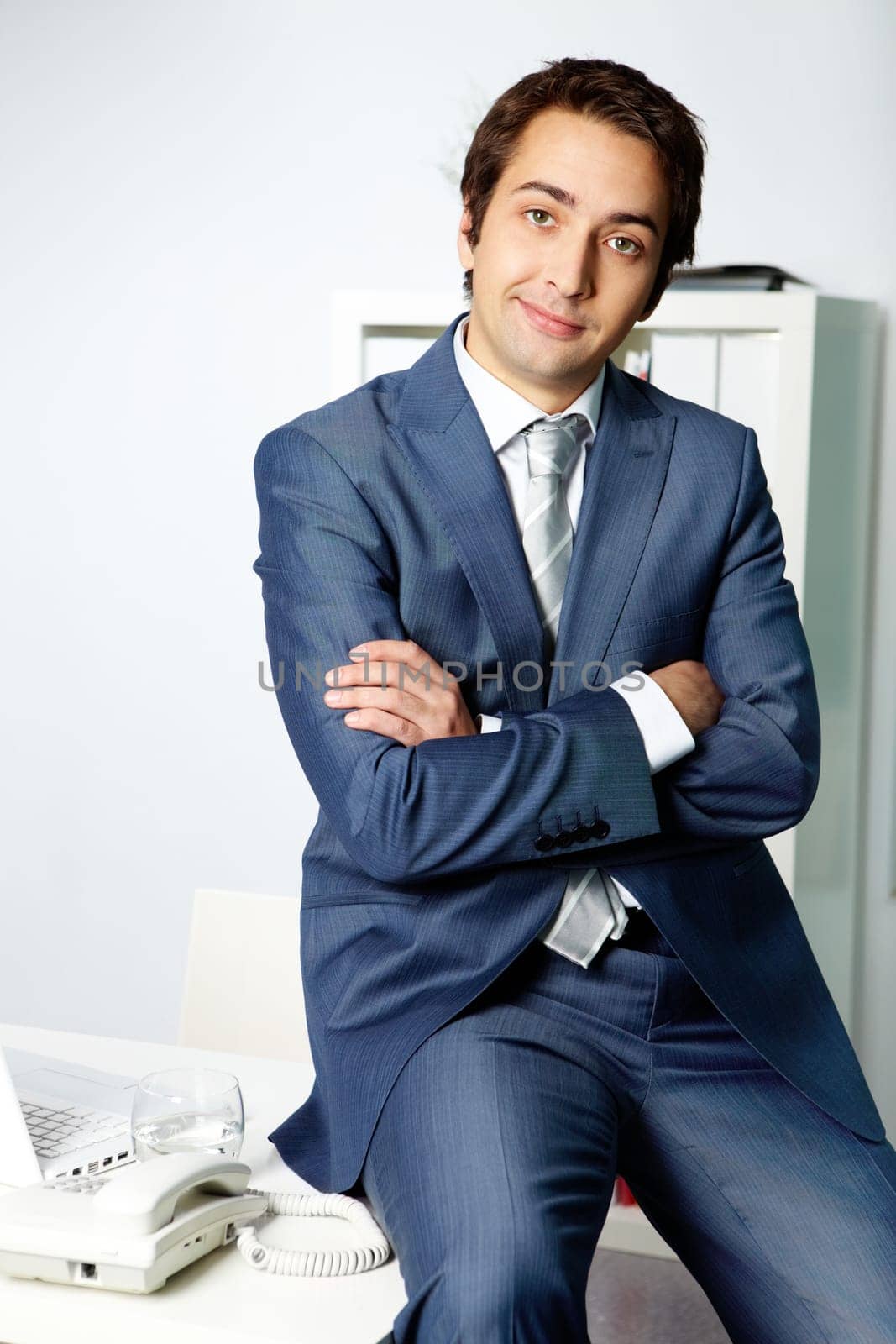Portrait of a successful employer in formalwear looking at camera