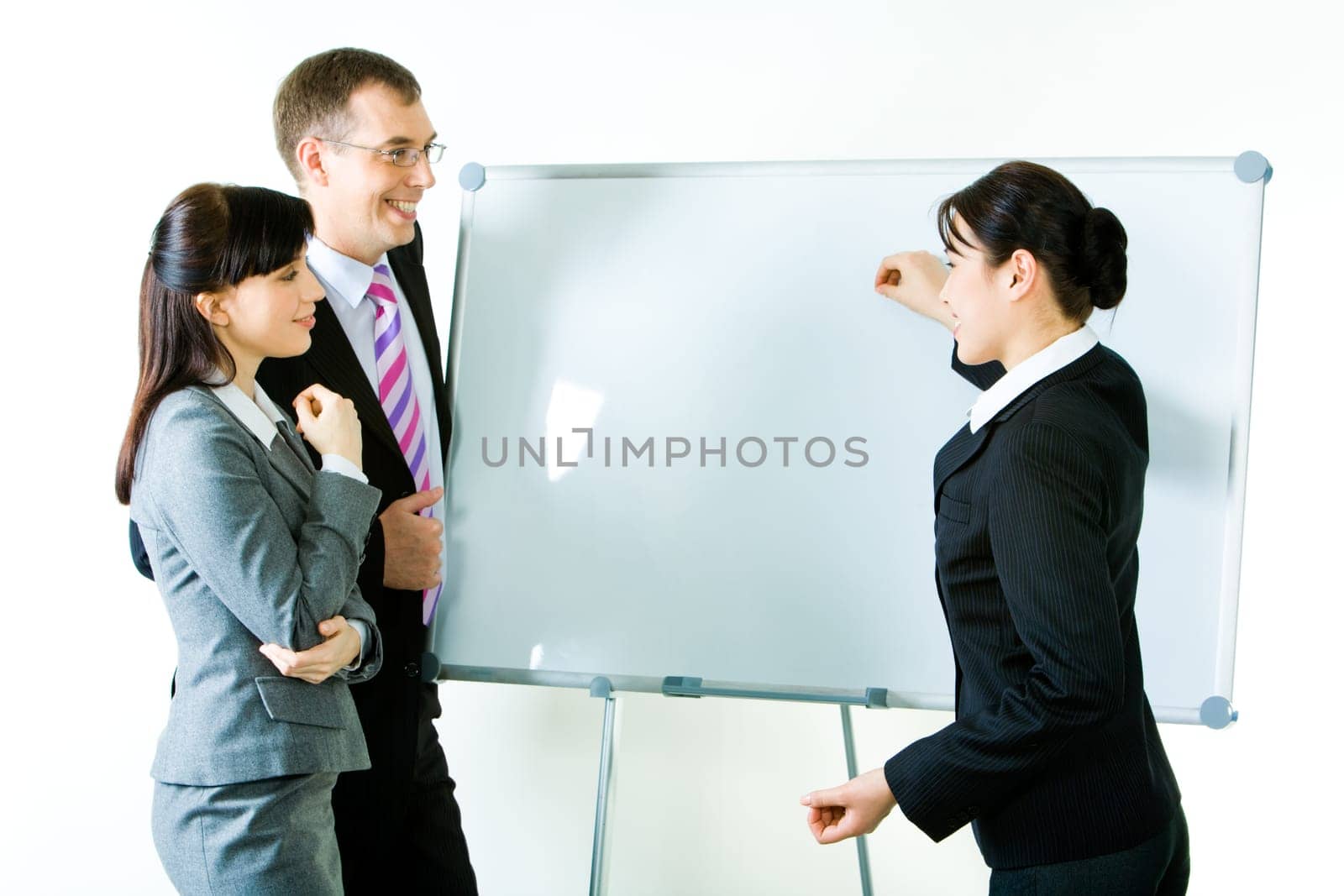 Portrait of business woman explaining her ideas on the whiteboard  at seminar