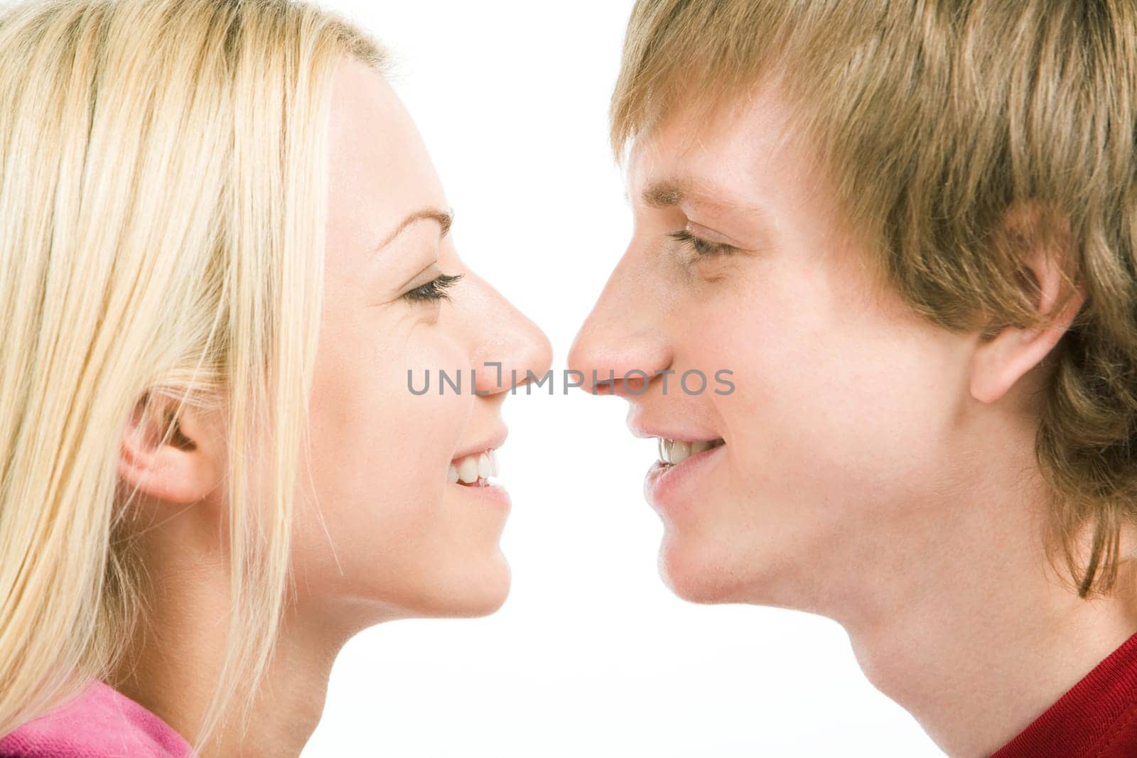 Loving couple looking at each other with smiles