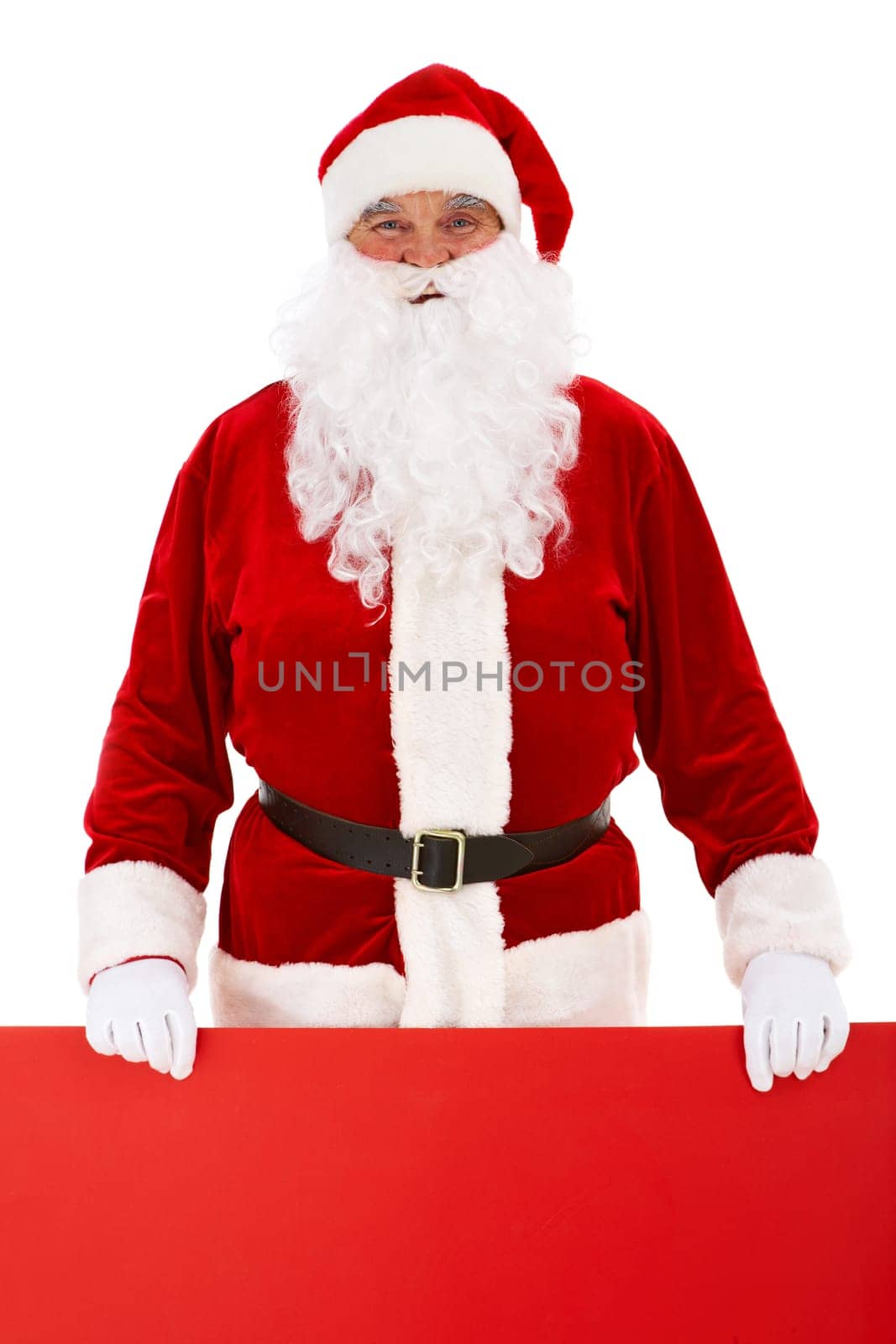 Photo of happy Santa Claus holding red billboard