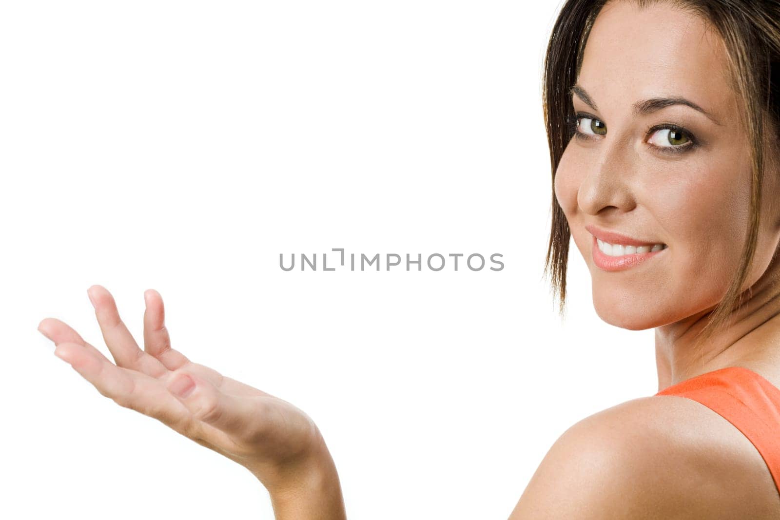 Face of charming looking at camera with her palm open and smiling