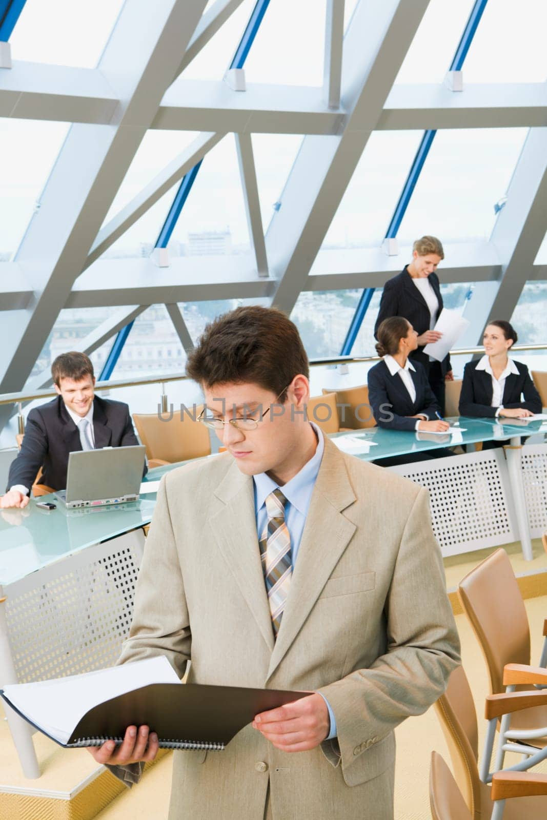Portrait of  successful boss in a working environment