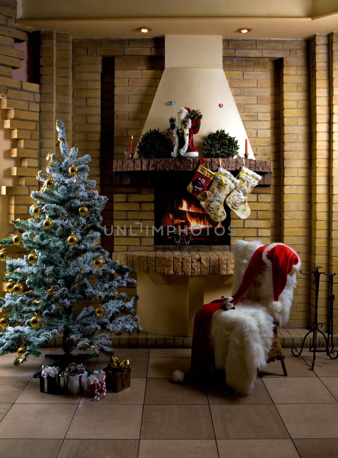 Image of nice comfortable room decorated for Christmas with fir tree, toys and decorations