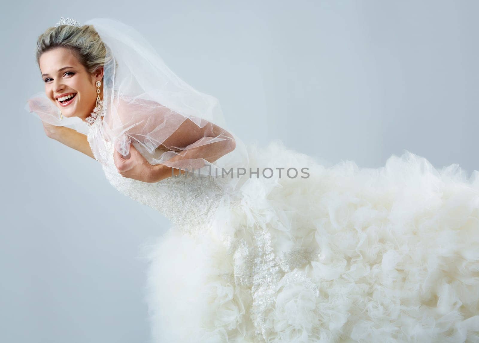 Portrait of pretty bride laughing