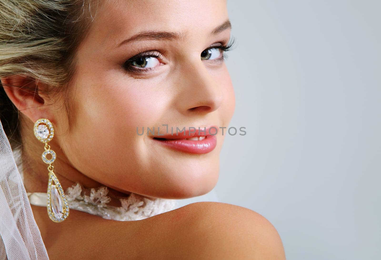 Portrait of pretty bride looking at camera