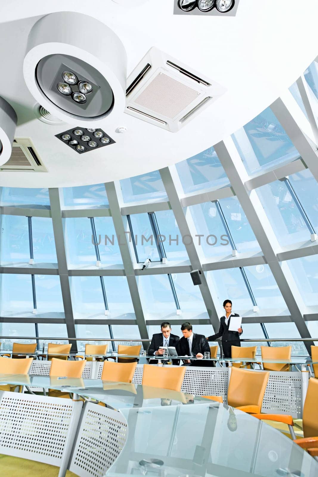 Customary conference room: glassy table, chair, large window