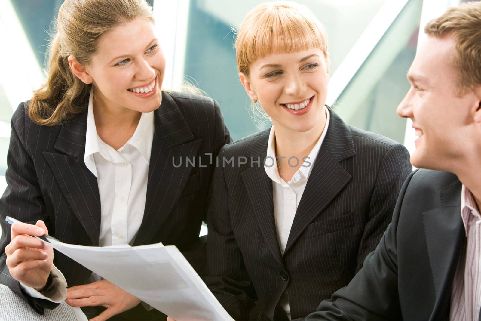 Image of business group discussing new plan in the office