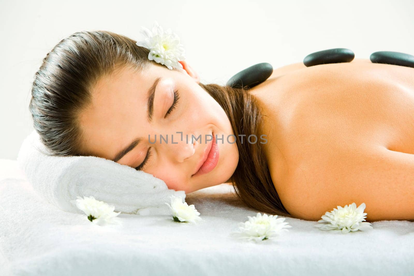 Image of young beautiful girl sleeping during a therapy