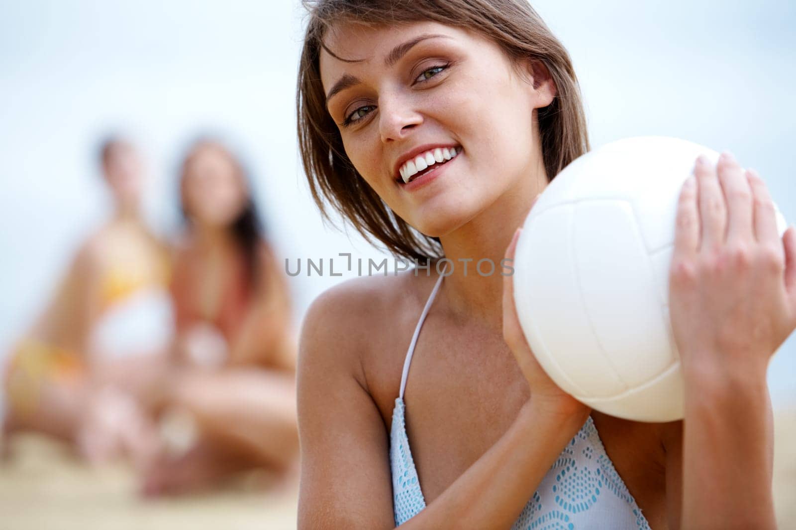 Portrait of fresh woman with ball looking at camera
