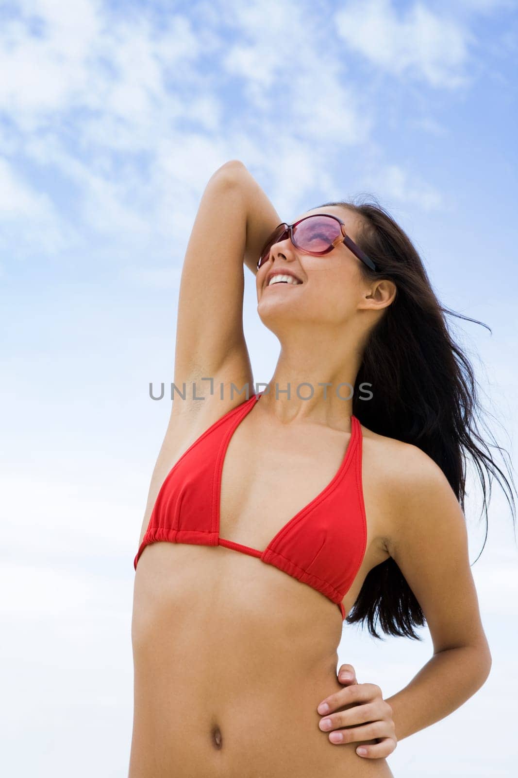 Image of luxurious woman having rest during summer vacation